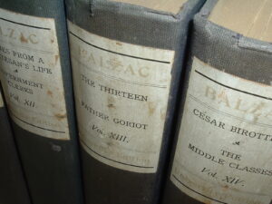 A photo of several volumes from the 1901 University Edition of The Works of Honoré de Balzac