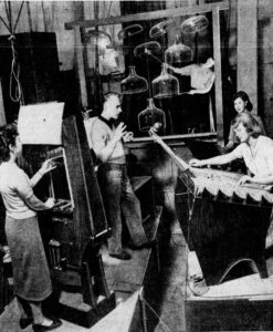 Partch (center) directing four college students in rehearsal. The San Francisco Examiner, Sunday, March 9, 1952