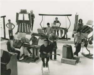 Harry Partch on the film set for "The Dreamer That Remains" with some of the instruments he built.Collection title: Harry Partch Collection, 1914-2007 Date: 1972 Partch photographs - Betty Freeman Sousa Archives and Center for American Music University of Illinois at Urbana-Champaign